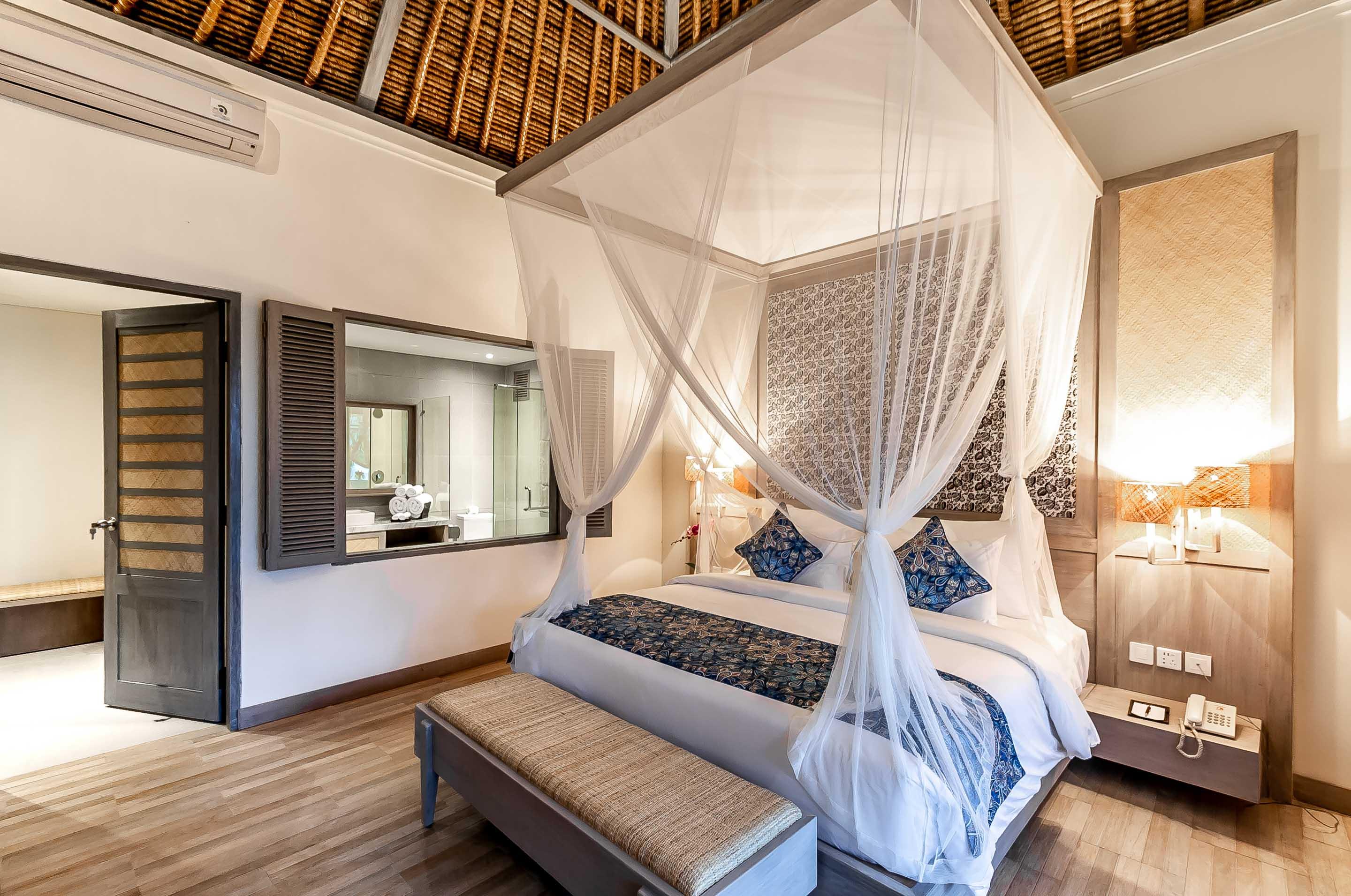 Nirwana Beach&Resort Candidasa Exterior foto A bedroom at the resort