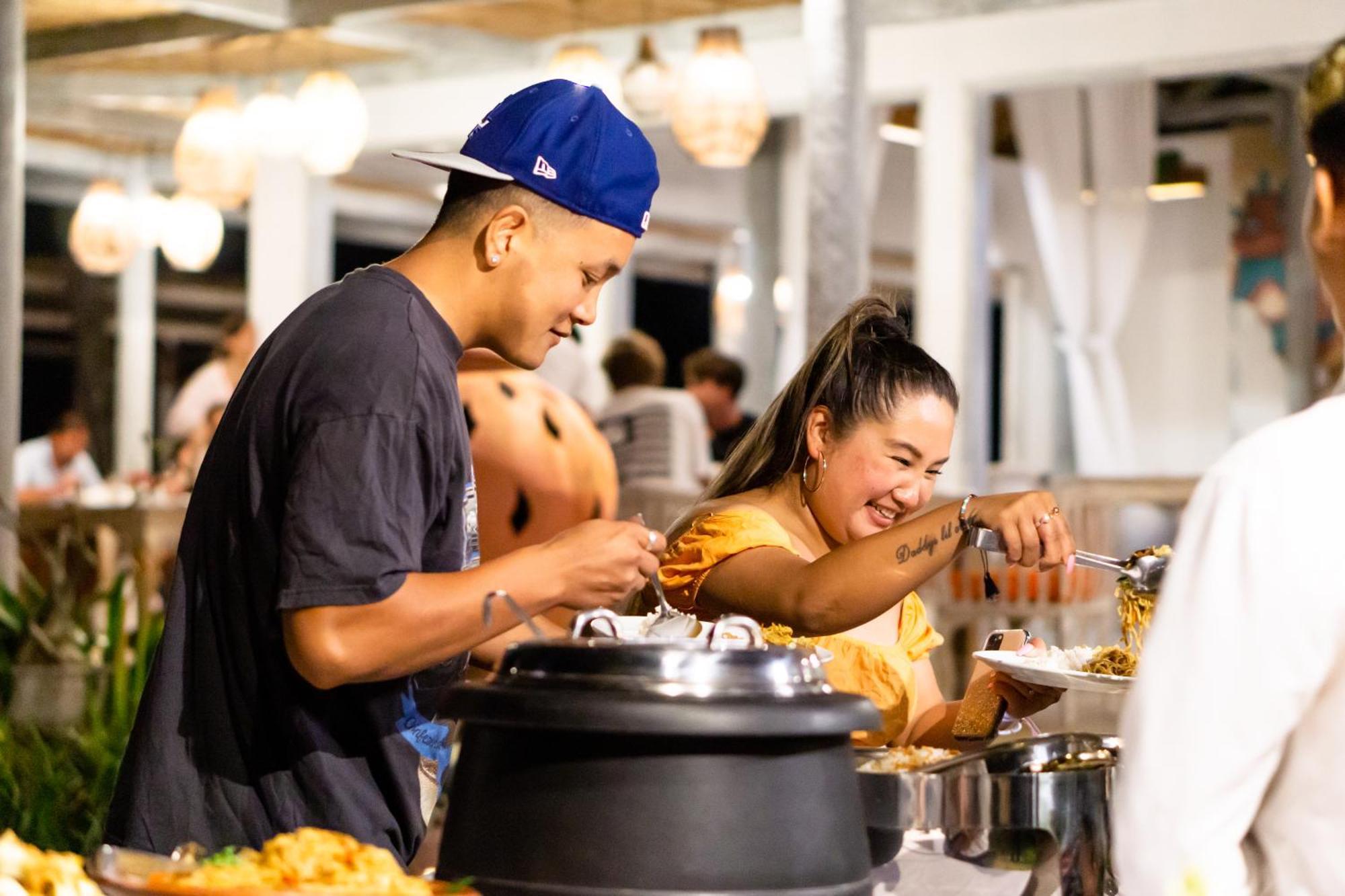 Nirwana Beach&Resort Candidasa Exterior foto Thai people eating at a buffet