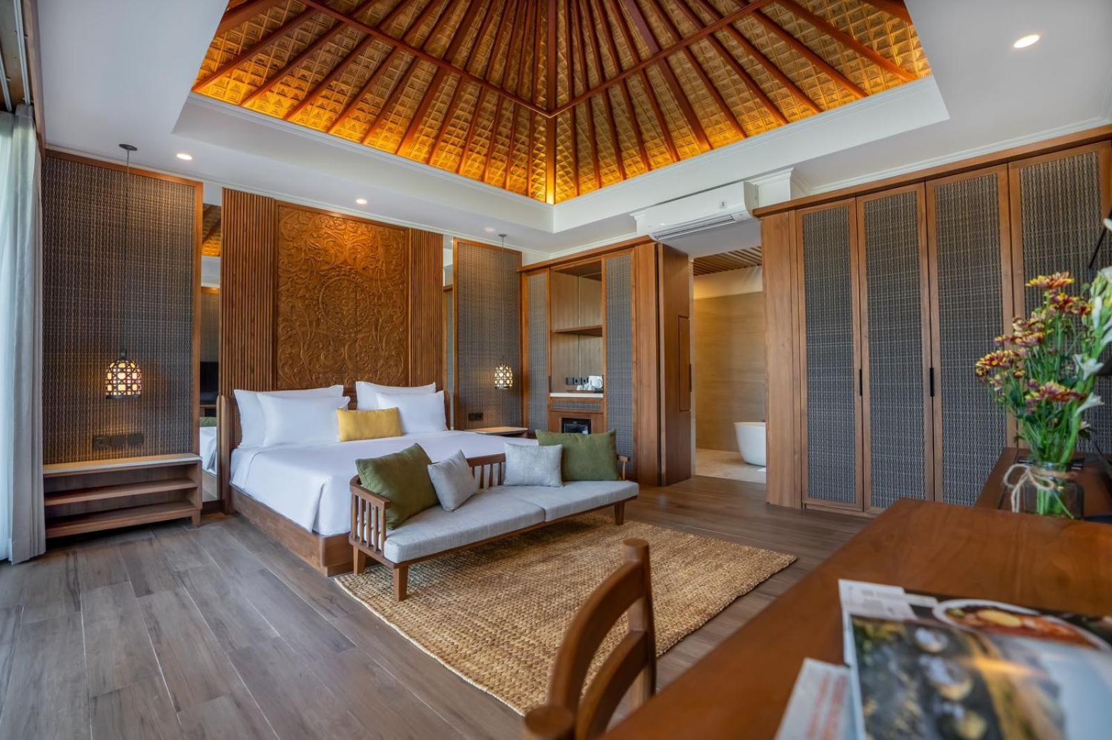 Nirwana Beach&Resort Candidasa Exterior foto A bedroom at the resort