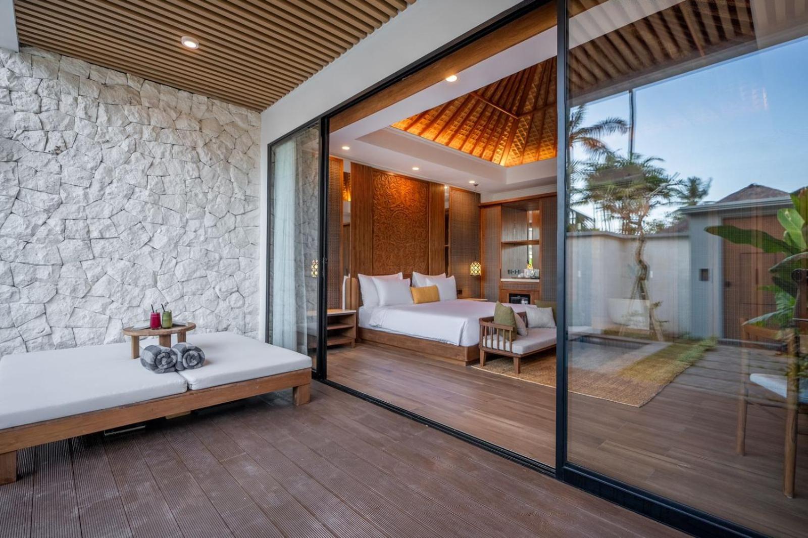 Nirwana Beach&Resort Candidasa Exterior foto A bedroom at the resort